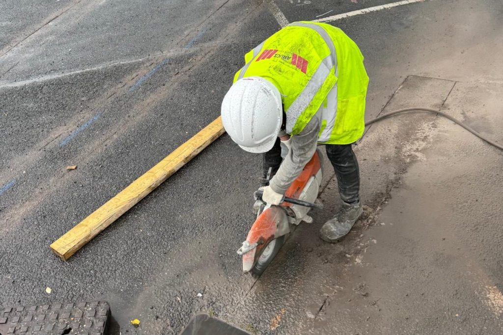Saw-cutting the existing surface for new electrical ducting, Ipswich