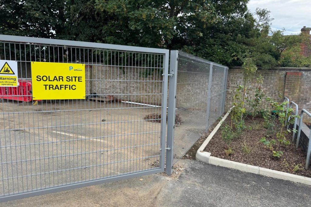 New wire-mesh fencing between car park and garages, Ipswich